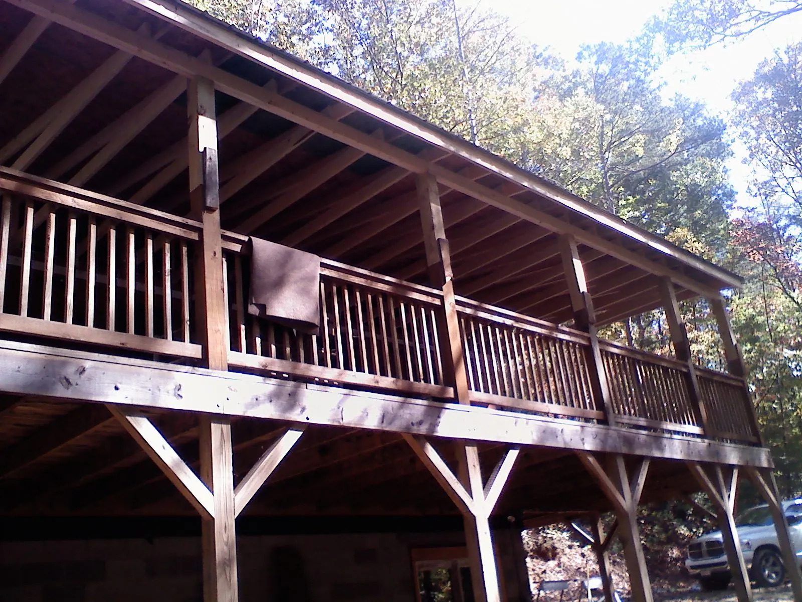 Timber framing under a new elevated porch and deck — Roof Leak Repair in Blanchard by Roofing Brothers